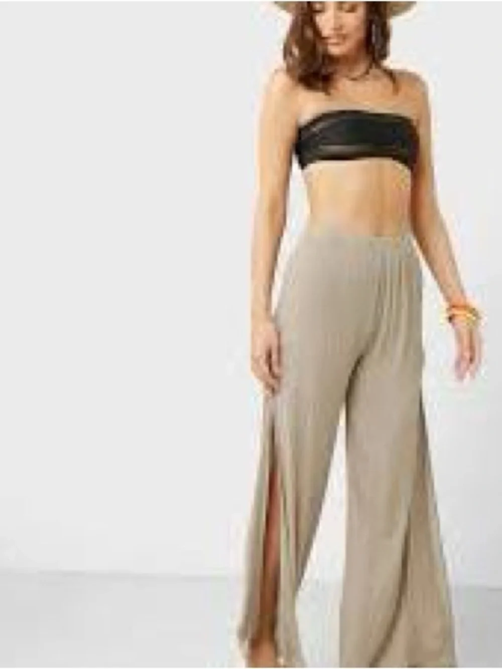 Nasty Gal Textured Wide-Leg Pants in Light Beige. Leg open to knee